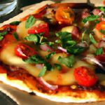 Red Tomato Pizza: A Juicy Twist on a Classic Favorite