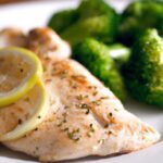 Zesty Grilled Lemon Herb Chicken Paired with Steamed Broccoli