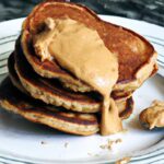 Hearty Whole-Grain Pancakes with Creamy Peanut Butter Twist