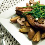 Savor the Perfect Steak with Baked Potato and Fresh Salad